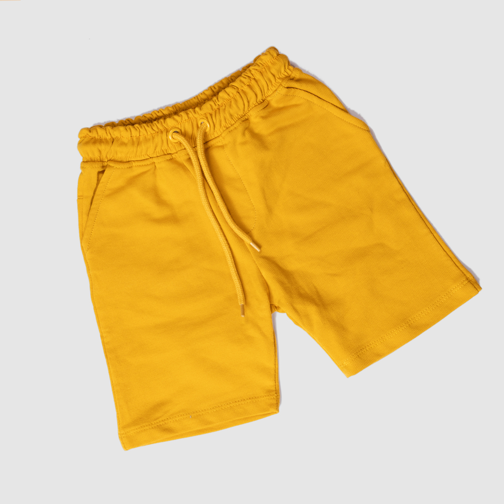Boys cotton shorts with pockets Mustard yellow shorts for kids Summer shorts for boys Comfortable boys play shorts Kids shorts with drawstring Breathable toddler boys shorts Made in Pakistan kids clothes Boys fashion summer shorts